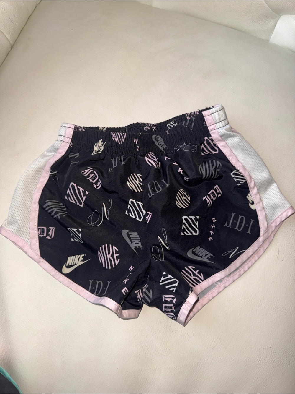 Nike Black Athletic Shorts with Pink Trim and Logo Print